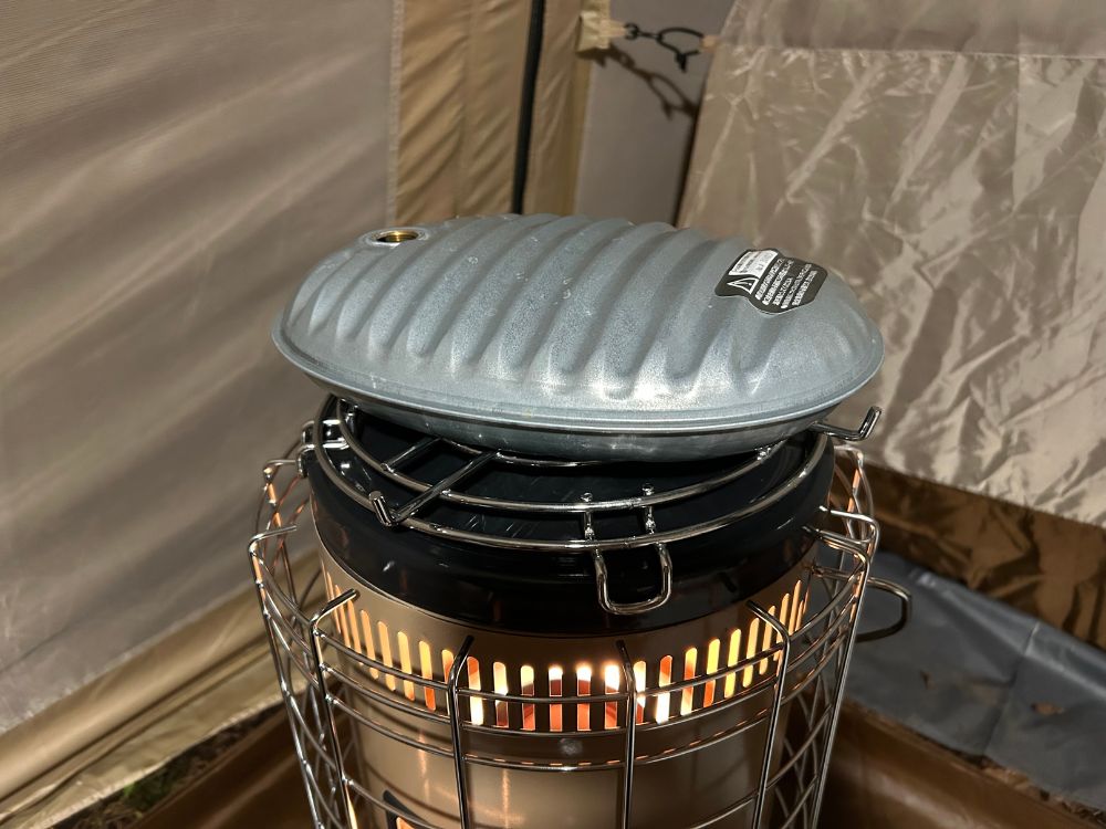 湯たんぽを暖めてる写真